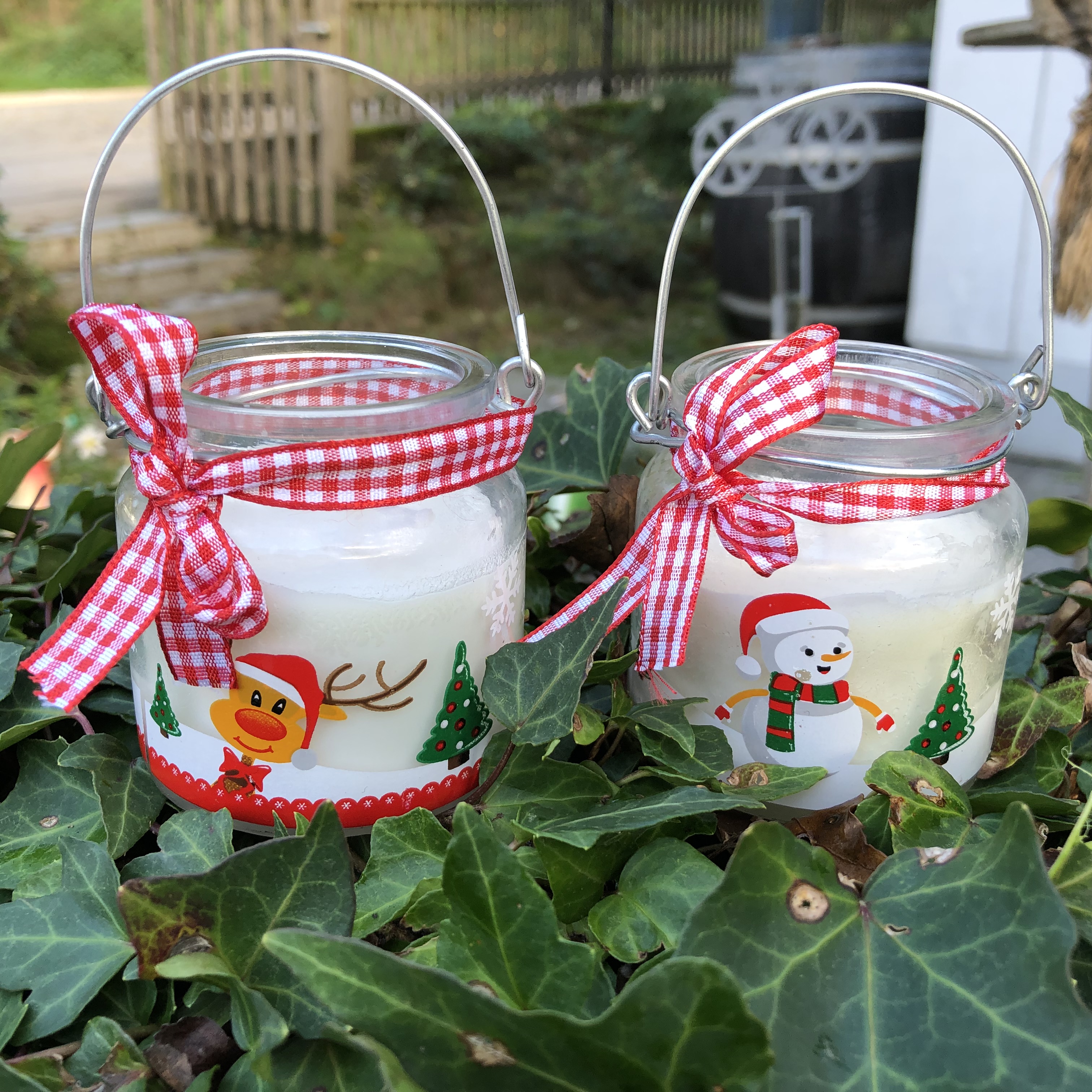 2 tlg. Set Duftkerzen im Glas mit süßem Rentiermotiv